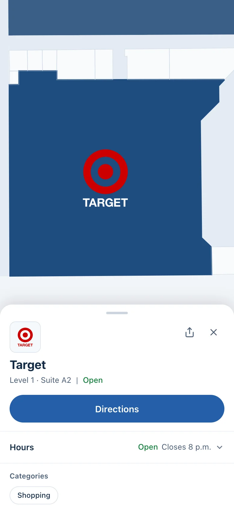 A store detail card on a phone, with the store’s location on the map and a button for directions.